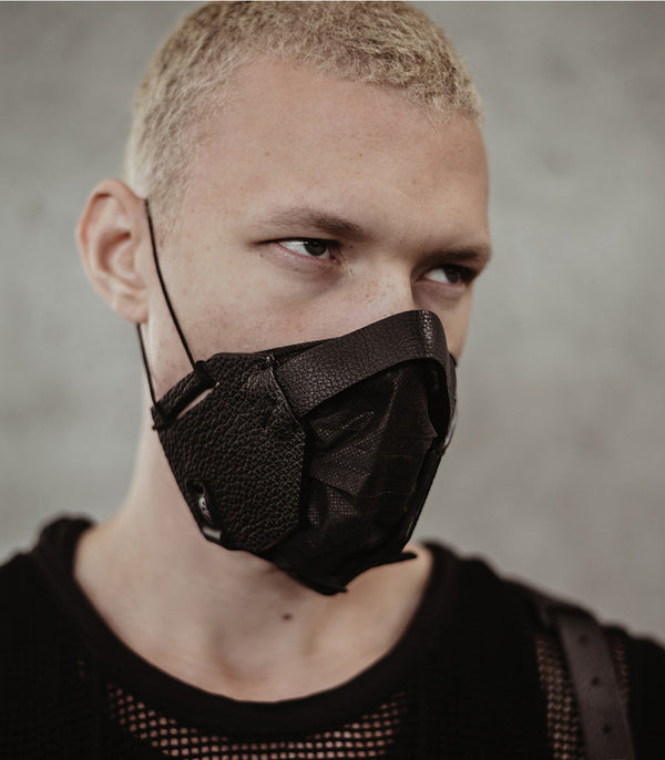 model wearing leather mask accessory badami and co